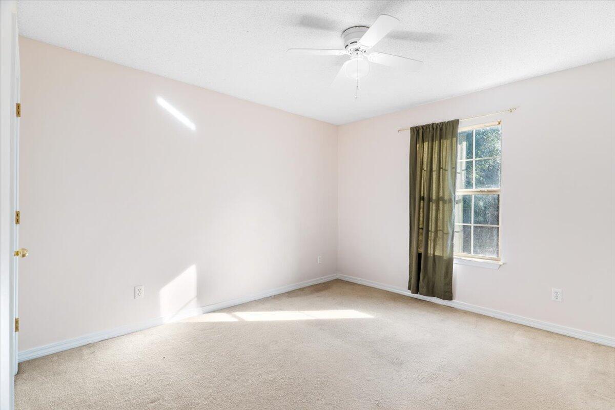 4640 Bobolink Way Crestview, FL 32539 - Photo 21 of 39 a view of an empty room with a window