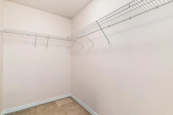 a view of a room with racks on the wall