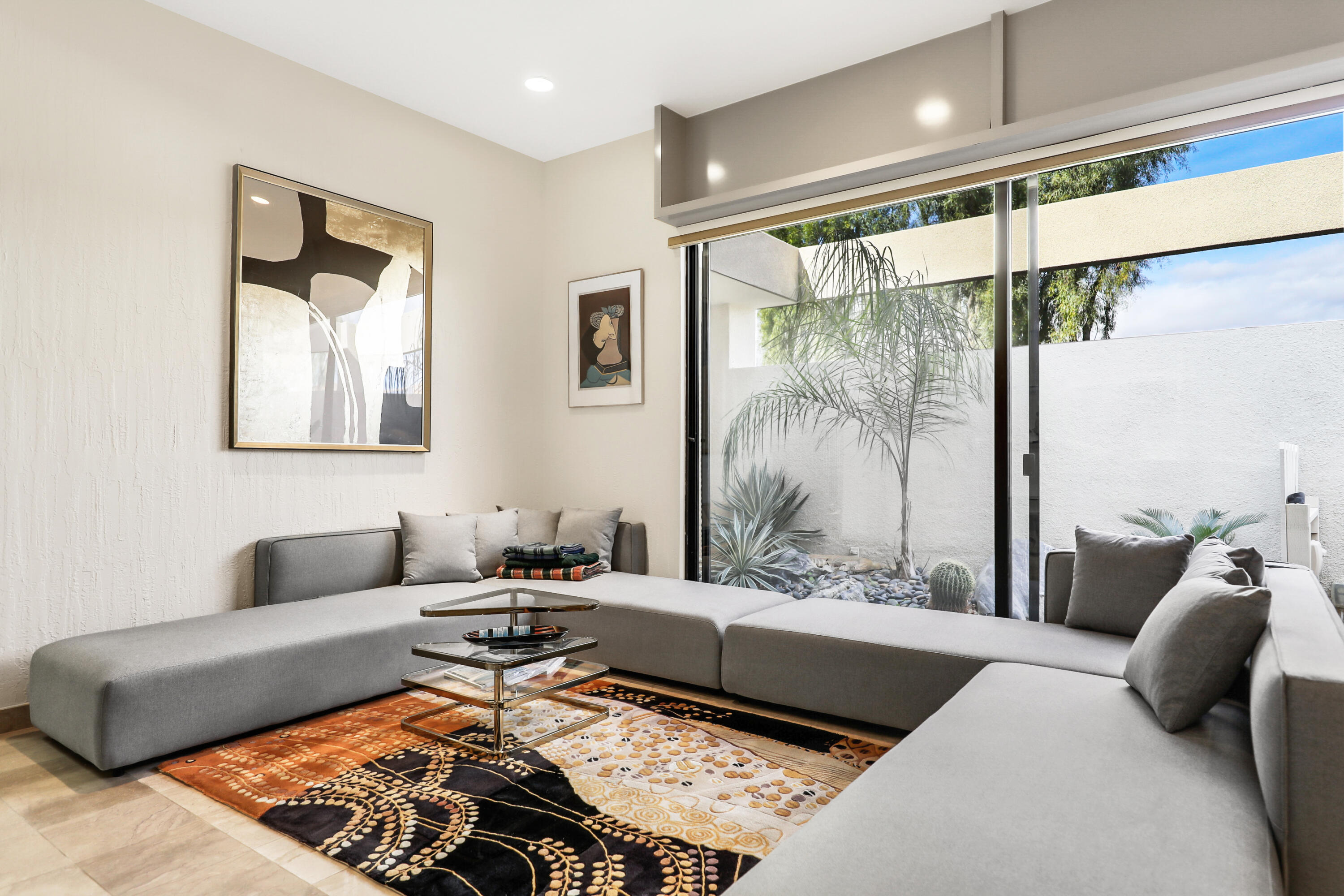 71000 Los Altos Court Rancho Mirage, CA 92270 - Photo 19 of 46 a living room with furniture and a large window