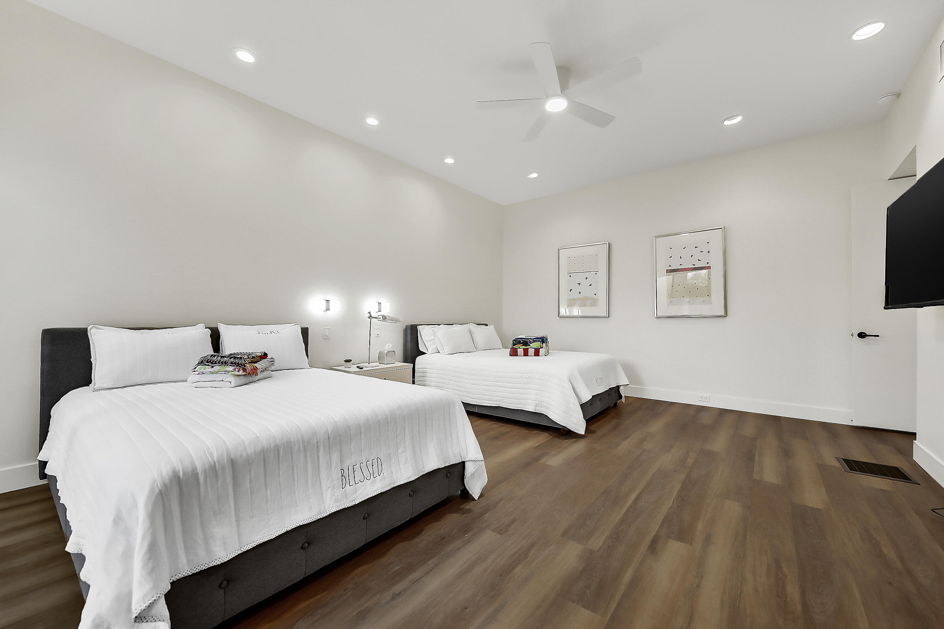 71000 Los Altos Court Rancho Mirage, CA 92270 - Photo 31 of 46 a bedroom with bed and a flat tv screen on dresser