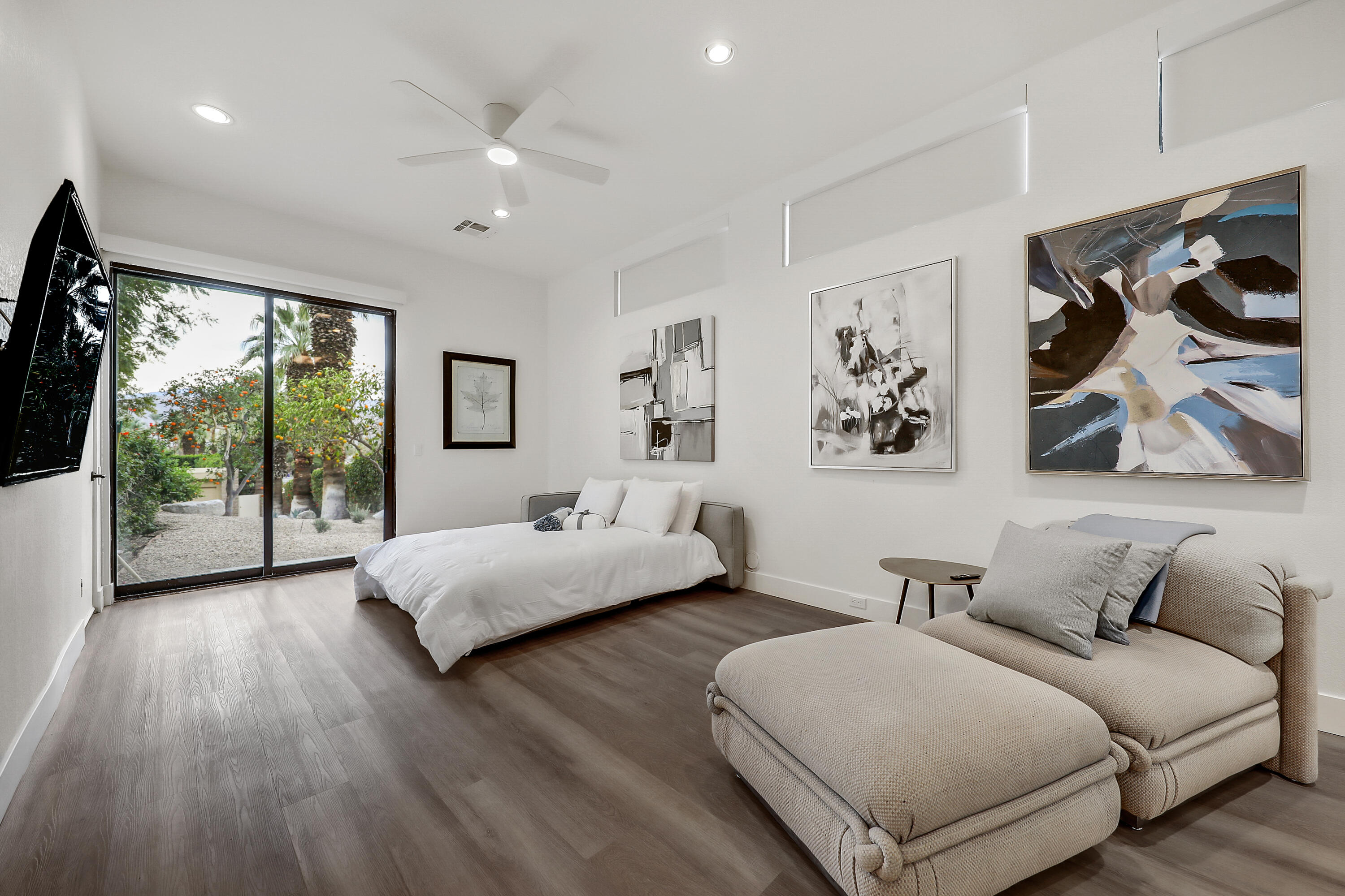 71000 Los Altos Court Rancho Mirage, CA 92270 - Photo 35 of 46 a spacious bedroom with two beds and a large window