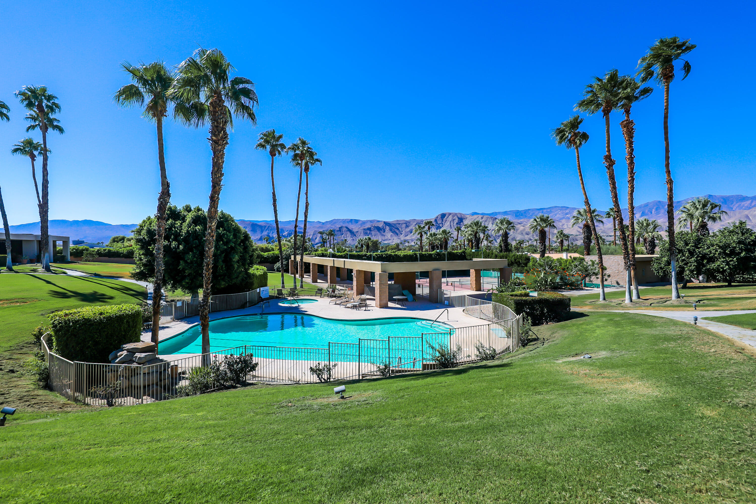 71000 Los Altos Court Rancho Mirage, CA 92270 - Photo 41 of 46 a view of a house with a backyard and a patio