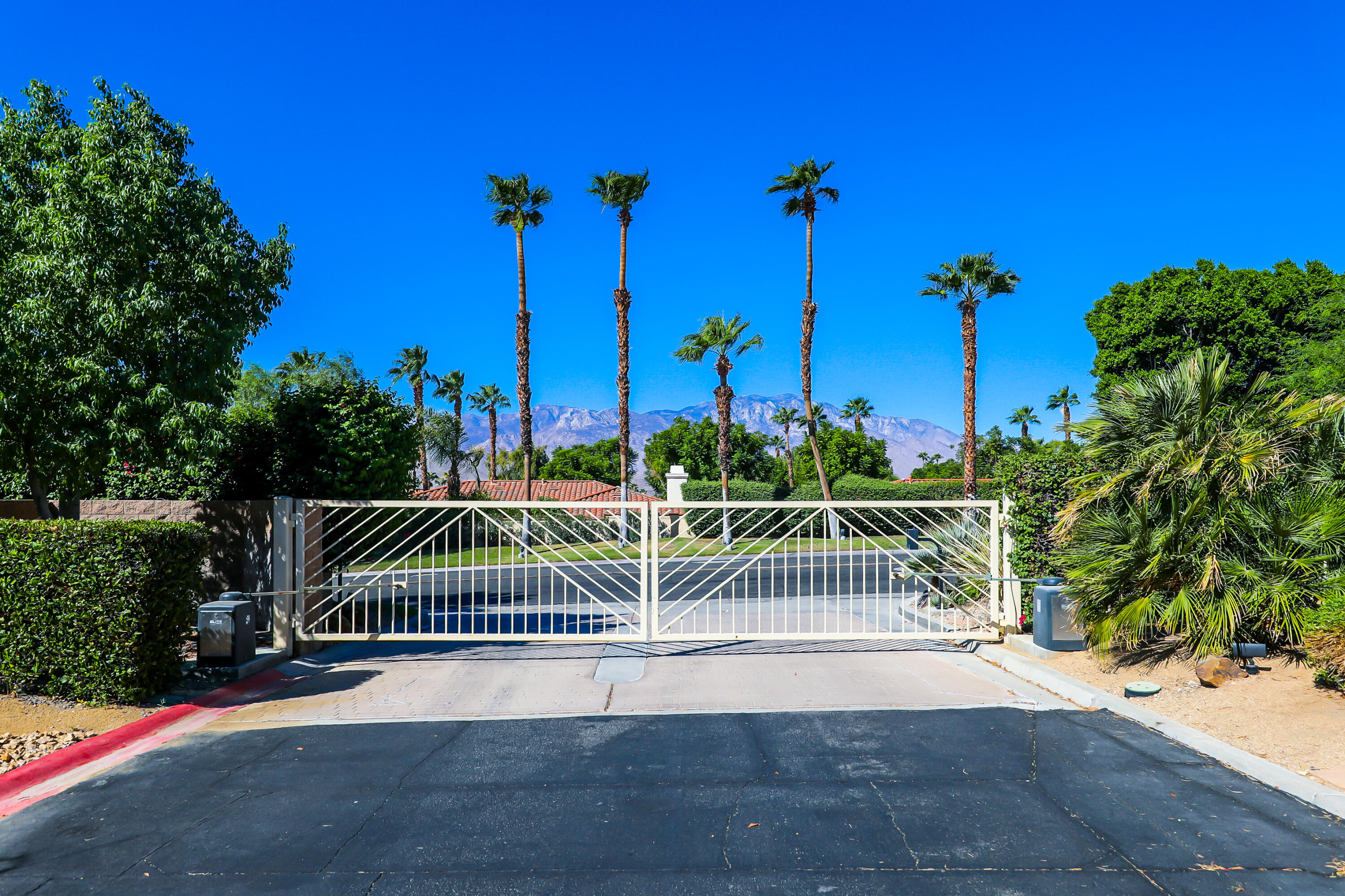 71000 Los Altos Court Rancho Mirage, CA 92270 - Photo 46 of 46 a view of a city street from a bench