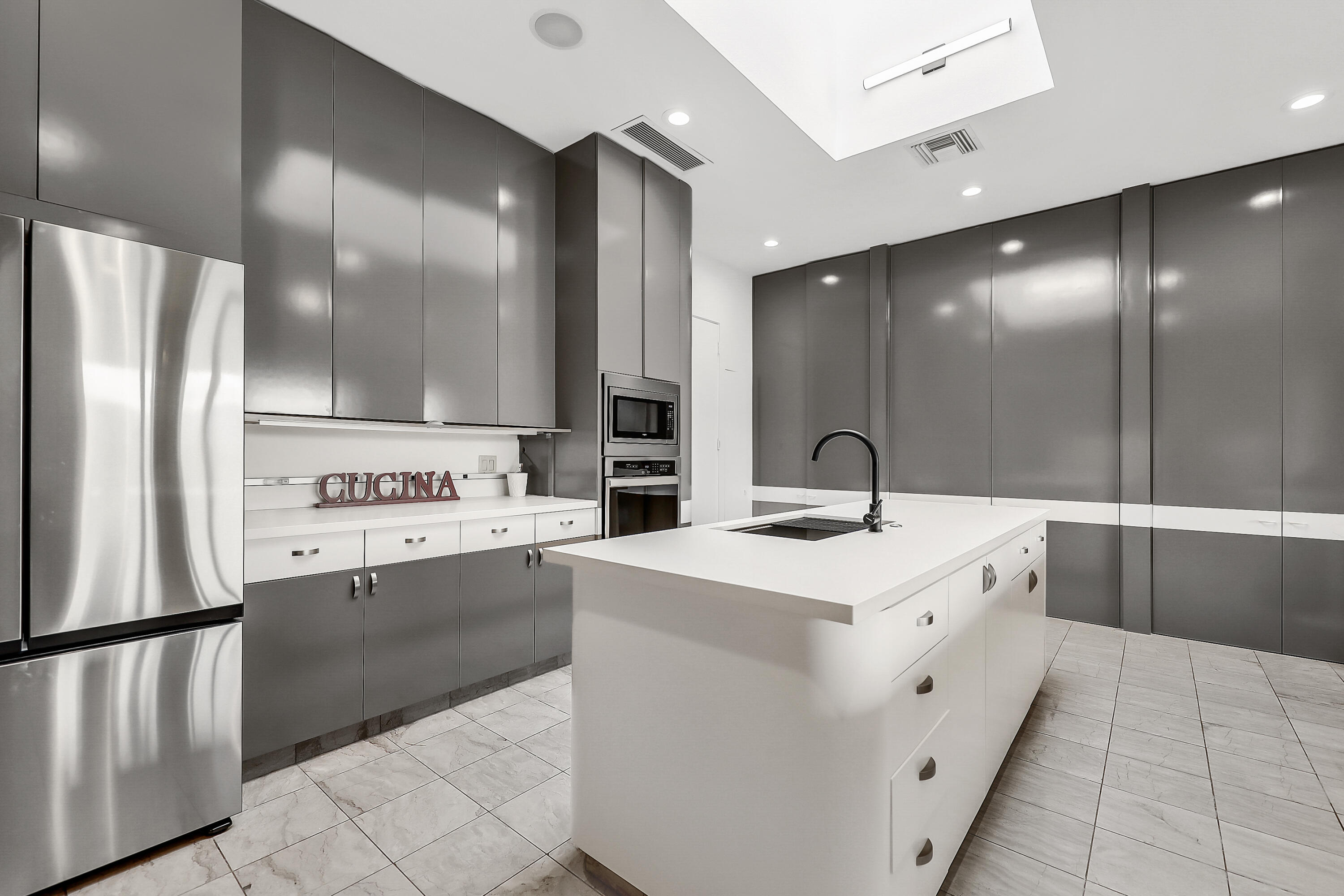 71000 Los Altos Court Rancho Mirage, CA 92270 - Photo 5 of 46 a kitchen with stainless steel appliances a refrigerator sink and cabinets