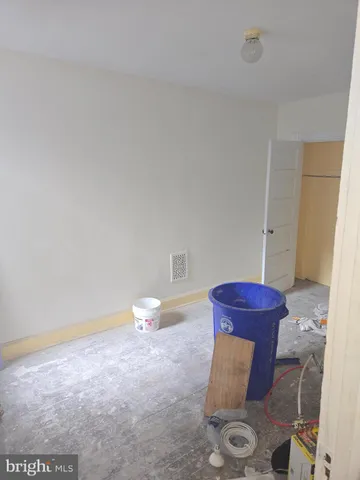 a bathroom with a toilet and a sink