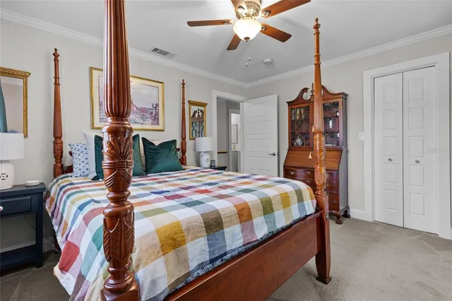 a bedroom with a bed and lamp