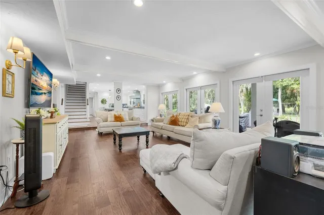 a living room with furniture and a table