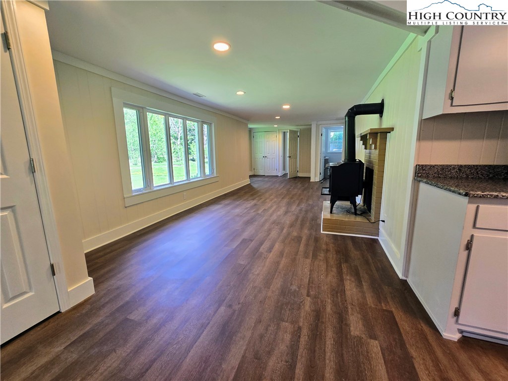 1207 Meat Camp Road Boone, NC 28607 - Photo 13 of 24 a view of a house with wooden floor and a sink
