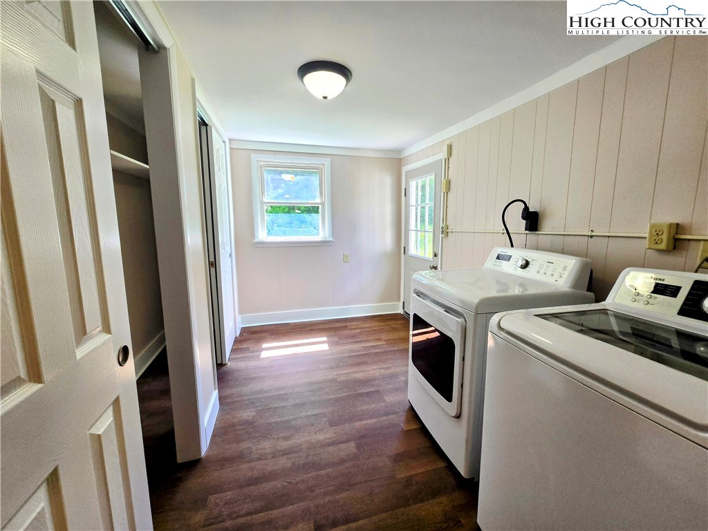 1207 Meat Camp Road Boone, NC 28607 - Photo 19 of 24 a view of washer and dryer with wooden floor