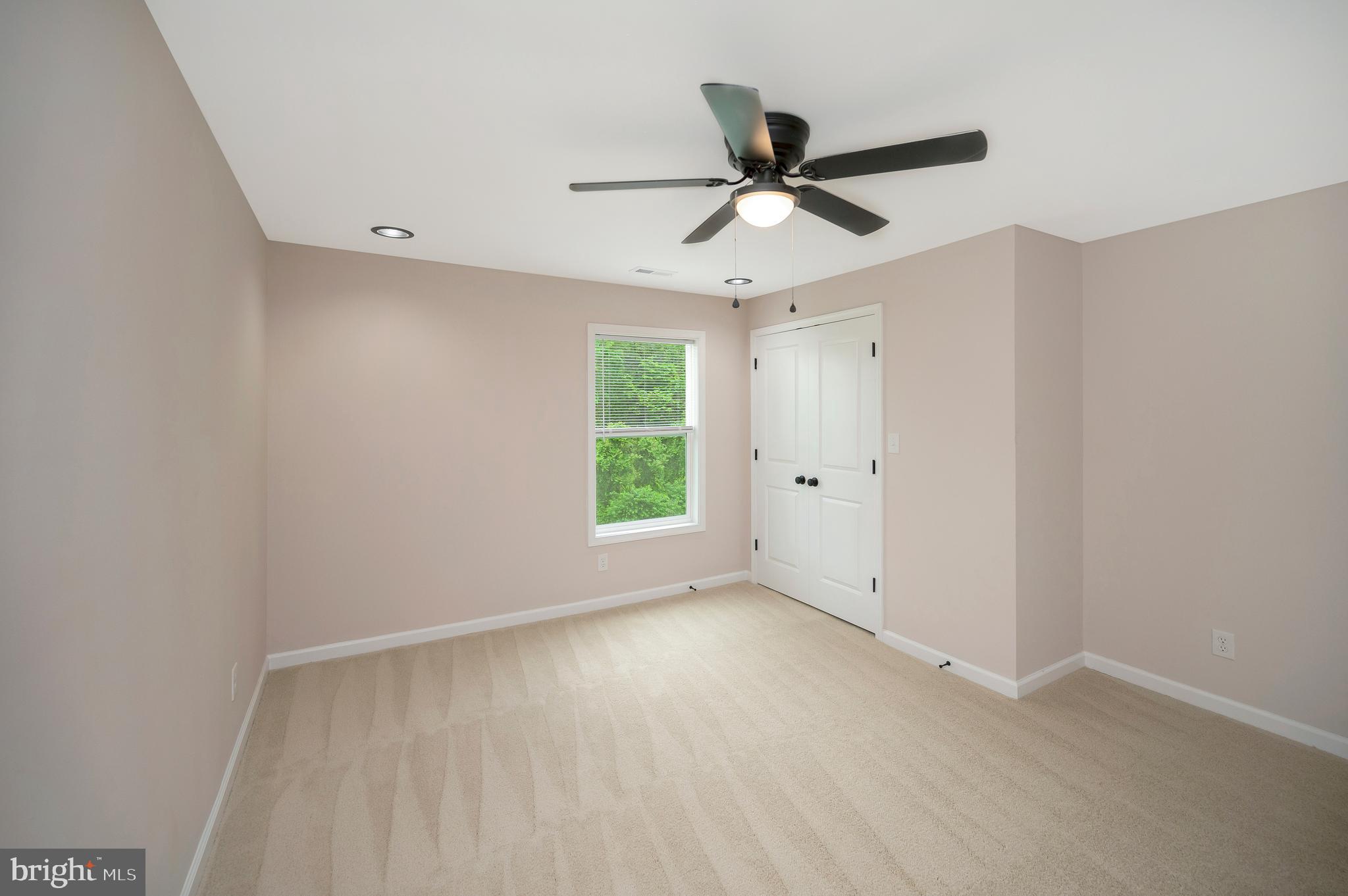14169 Silver Hill Road Sumerduck, VA 22742 - Photo 23 of 40 a view of an empty room with a window