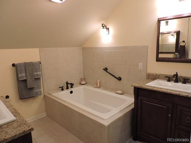 2137 Riccardo Lane Fort Garland, CO 81133 - Photo 26 of 50 a bathroom with a sink and a mirror
