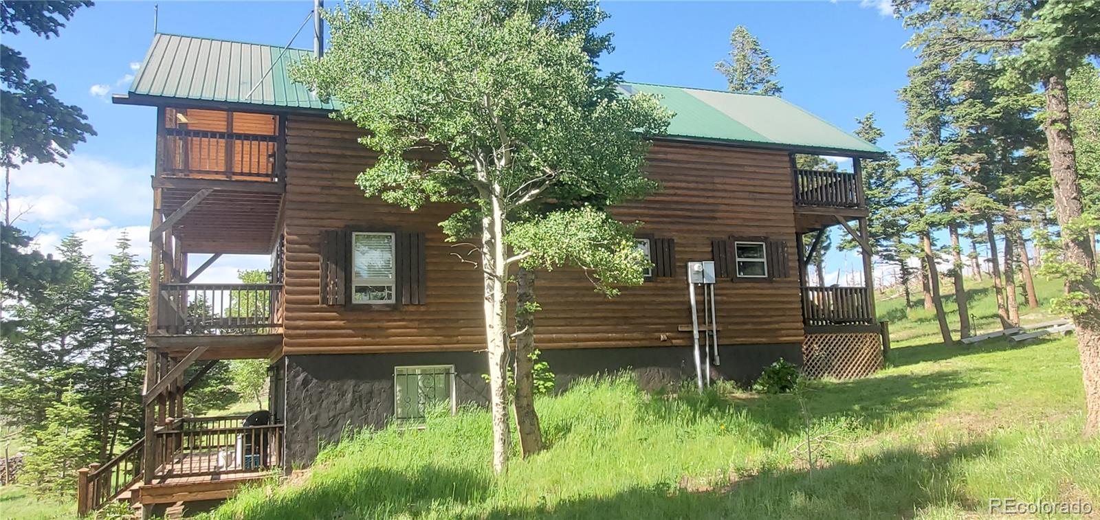 2137 Riccardo Lane Fort Garland, CO 81133 - Photo 48 of 50 front view of a house with a yard