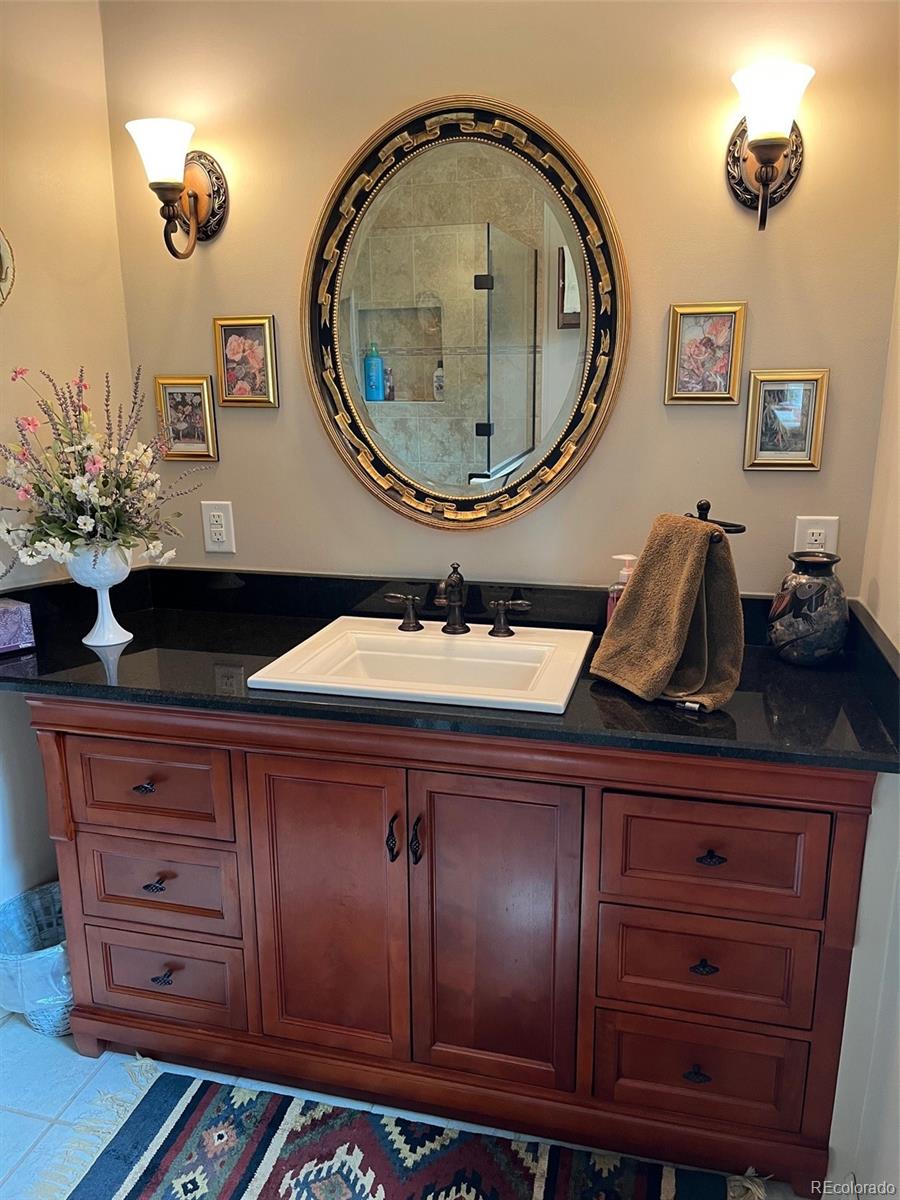 2137 Riccardo Lane Fort Garland, CO 81133 - Photo 10 of 50 a bathroom with a sink and a mirror