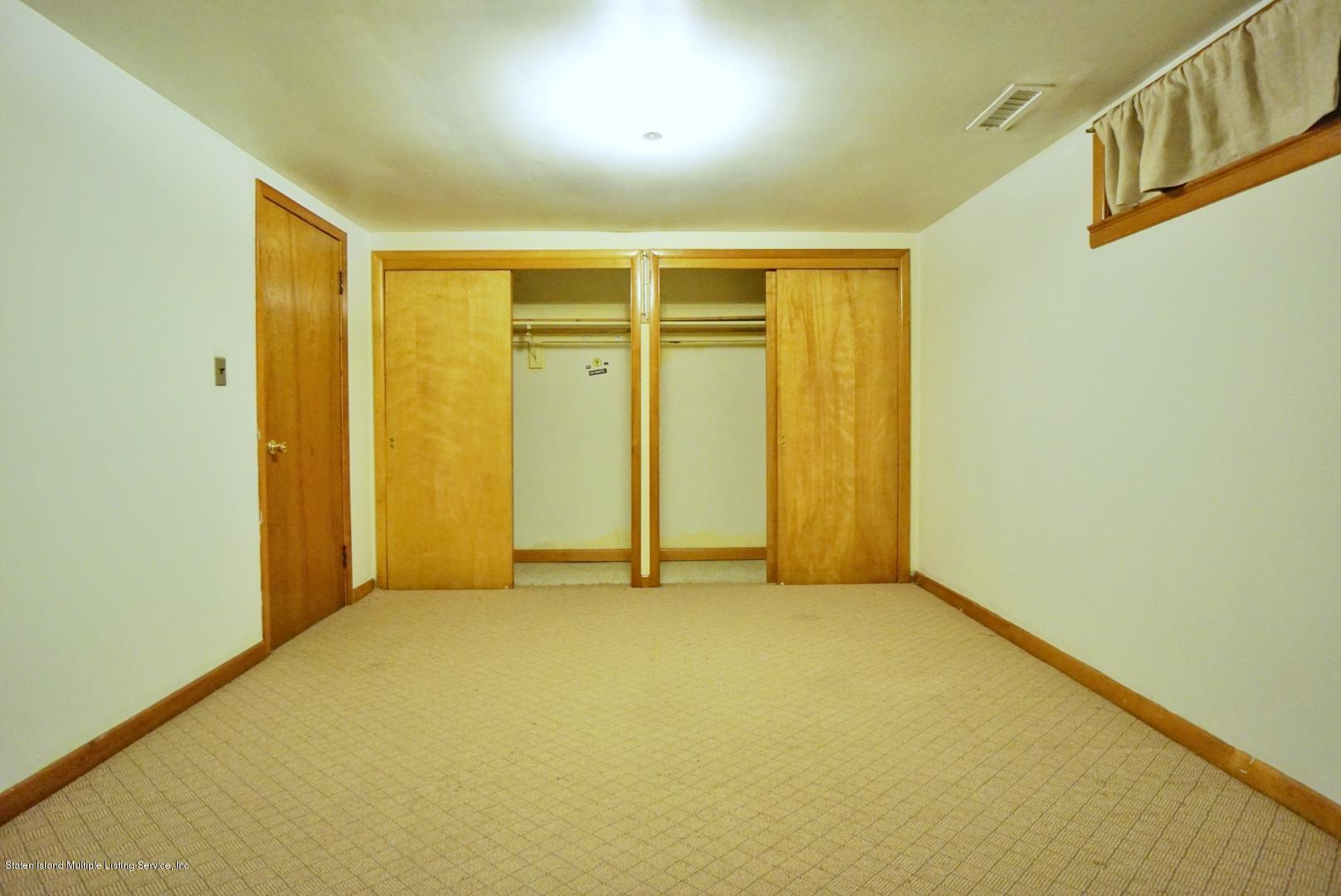 1099 Richmond Road Staten Island, NY 10304 - Photo 22 of 28 an empty room with closet