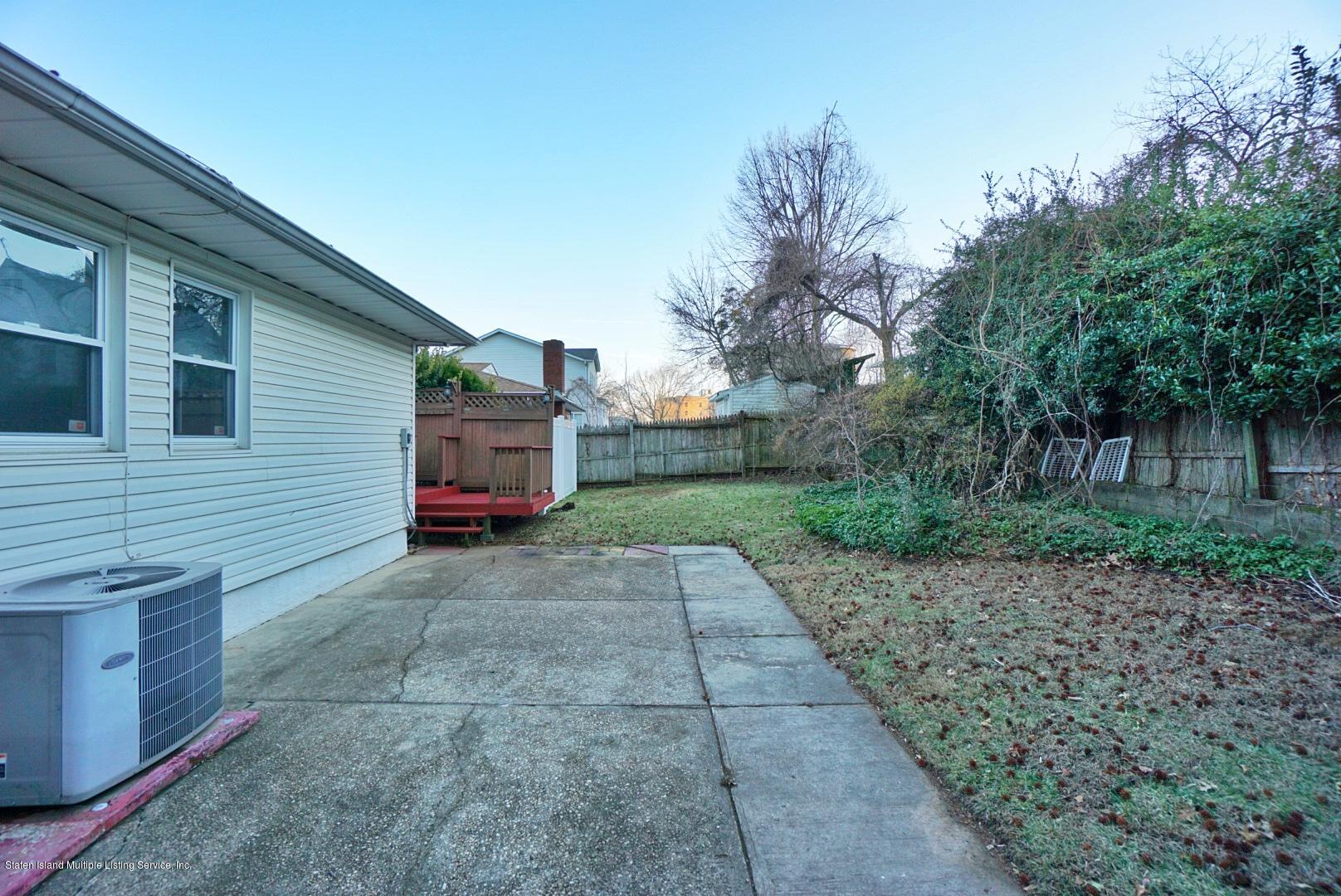 1099 Richmond Road Staten Island, NY 10304 - Photo 26 of 28 a view of a house with a yard