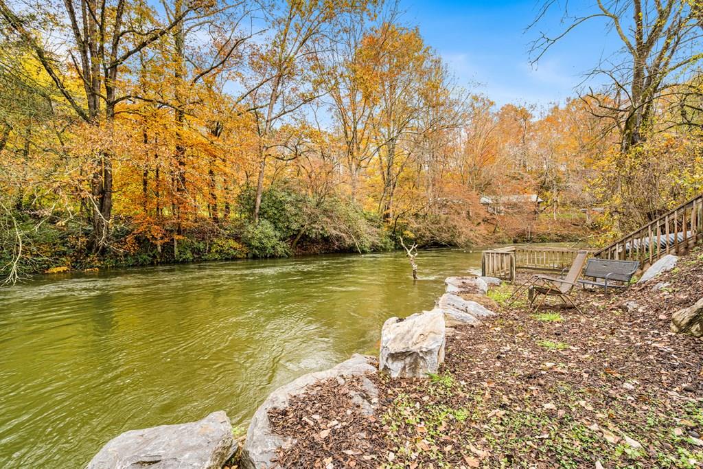 251 Rivers Edge Drive Hayesville, NC 28904 - Photo 1 of 45 a view of a lake with houses