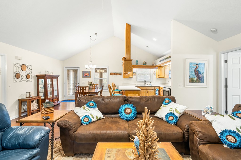 251 Rivers Edge Drive Hayesville, NC 28904 - Photo 13 of 45 a living room with furniture and a large window