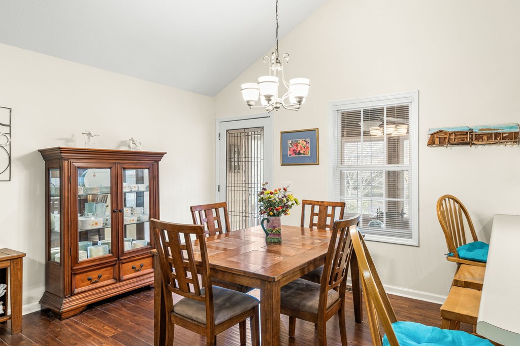 251 Rivers Edge Drive Hayesville, NC 28904 - Photo 17 of 45 a view of a dining room with furniture window and outside view