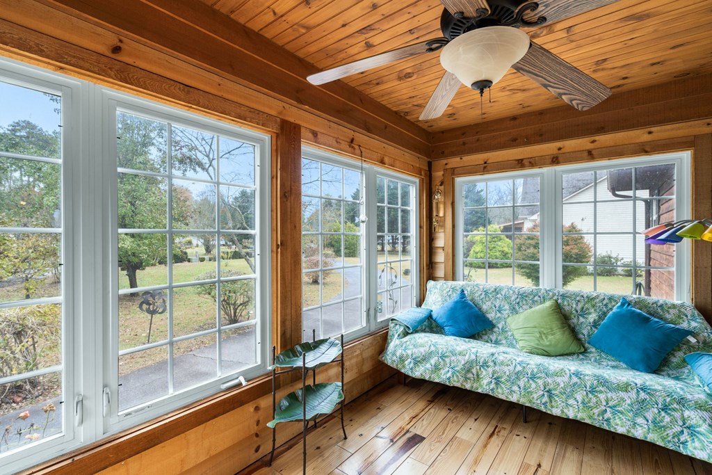 251 Rivers Edge Drive Hayesville, NC 28904 - Photo 18 of 45 a living room with furniture and a large window