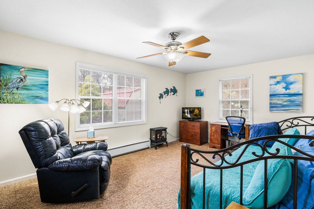 251 Rivers Edge Drive Hayesville, NC 28904 - Photo 20 of 45 a living room with furniture and a window