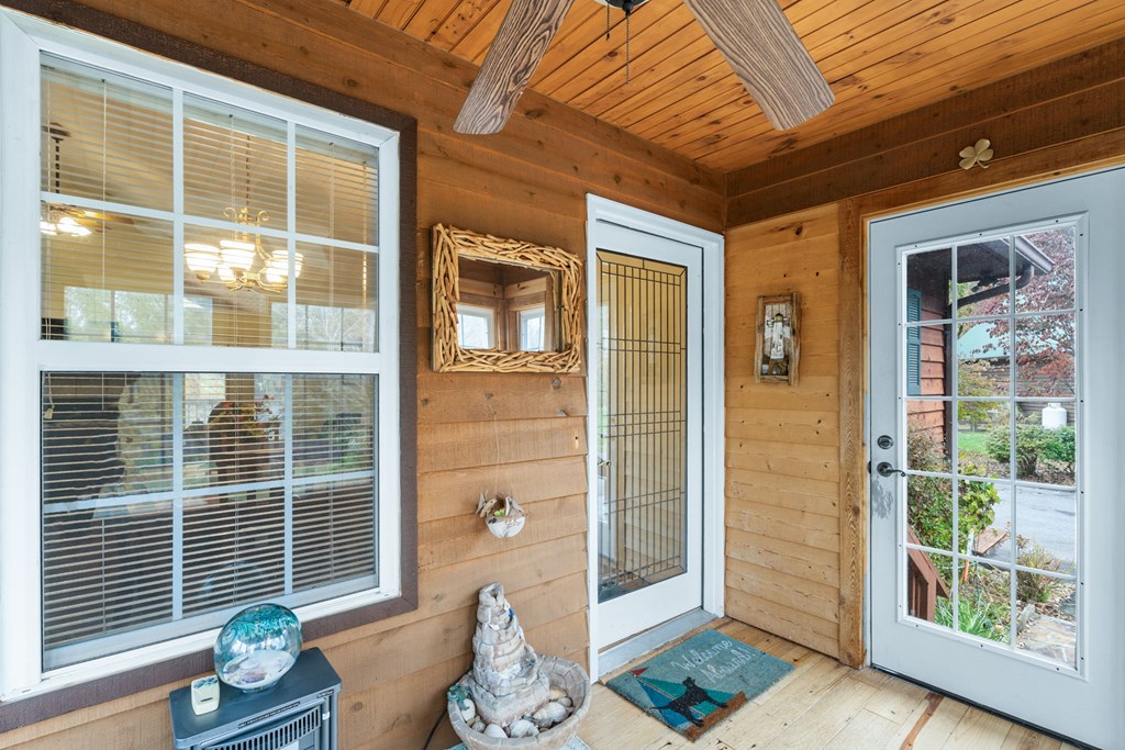 251 Rivers Edge Drive Hayesville, NC 28904 - Photo 28 of 45 a living room with furniture and a window