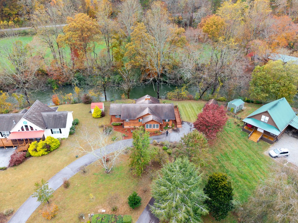 251 Rivers Edge Drive Hayesville, NC 28904 - Photo 29 of 45 an aerial view of a house with swimming pool and lake view