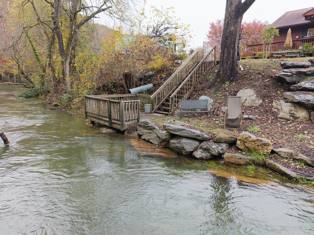 251 Rivers Edge Drive Hayesville, NC 28904 - Photo 34 of 45 a view of a house with a yard