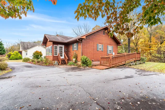 a view of a balcony with wooden floor