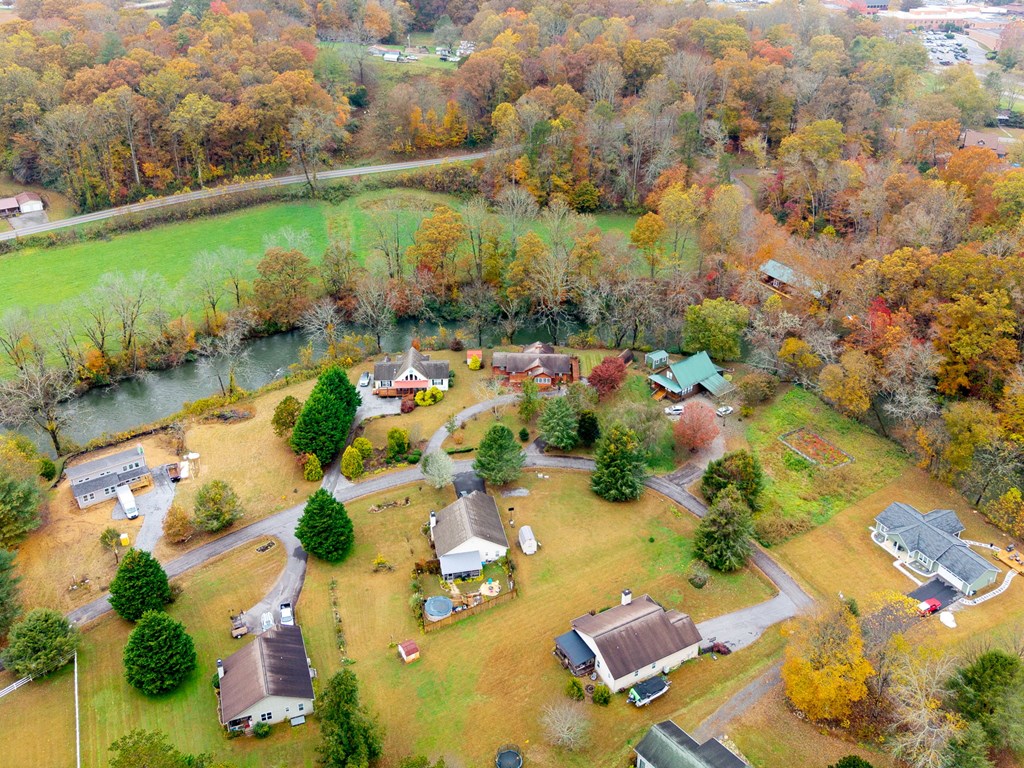 251 Rivers Edge Drive Hayesville, NC 28904 - Photo 39 of 45 an aerial view of a houses with yard