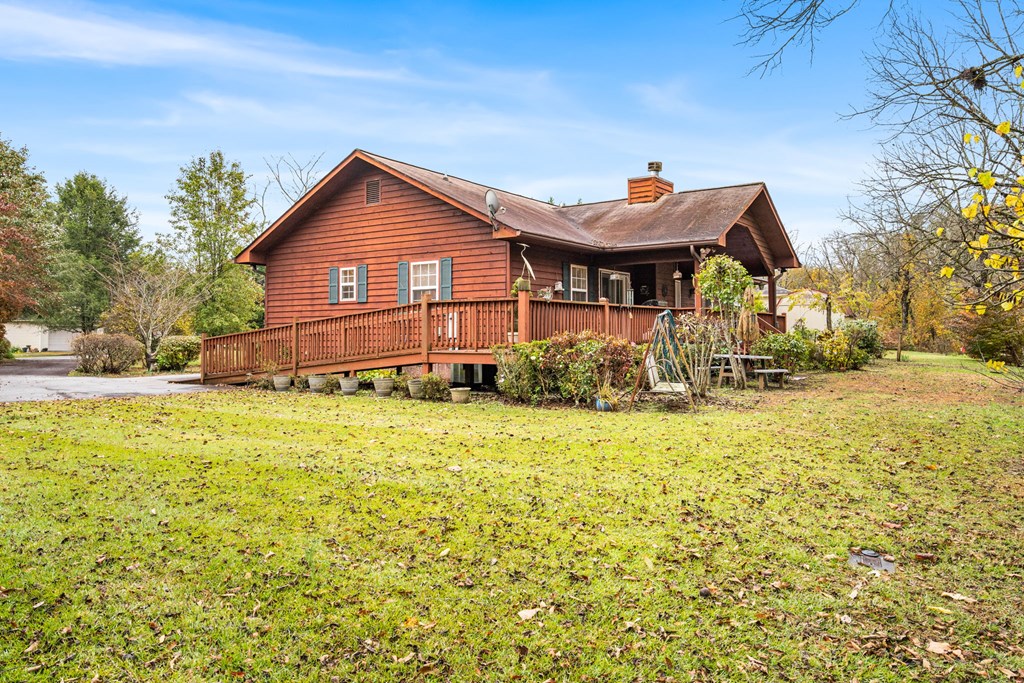 251 Rivers Edge Drive Hayesville, NC 28904 - Photo 40 of 45 a front view of a house with a yard