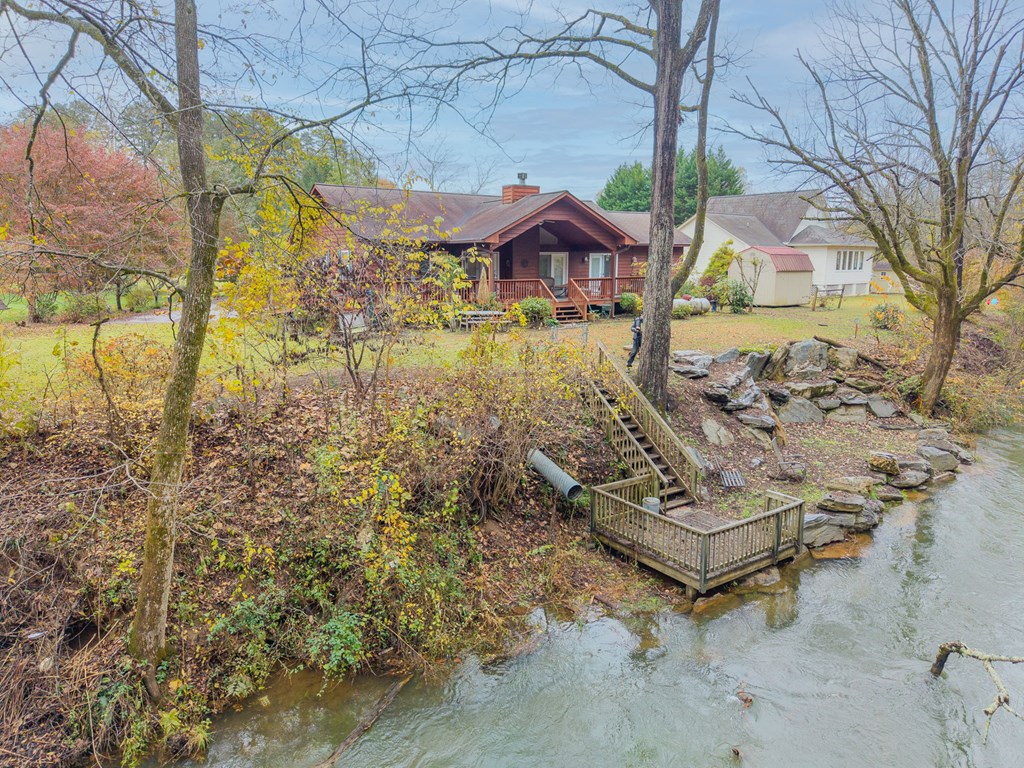 251 Rivers Edge Drive Hayesville, NC 28904 - Photo 4 of 45 a view of yard with outdoor seating