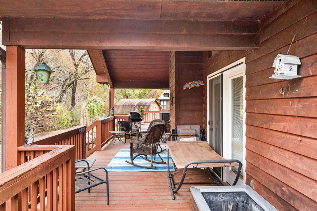 251 Rivers Edge Drive Hayesville, NC 28904 - Photo 42 of 45 a living room with furniture and a table
