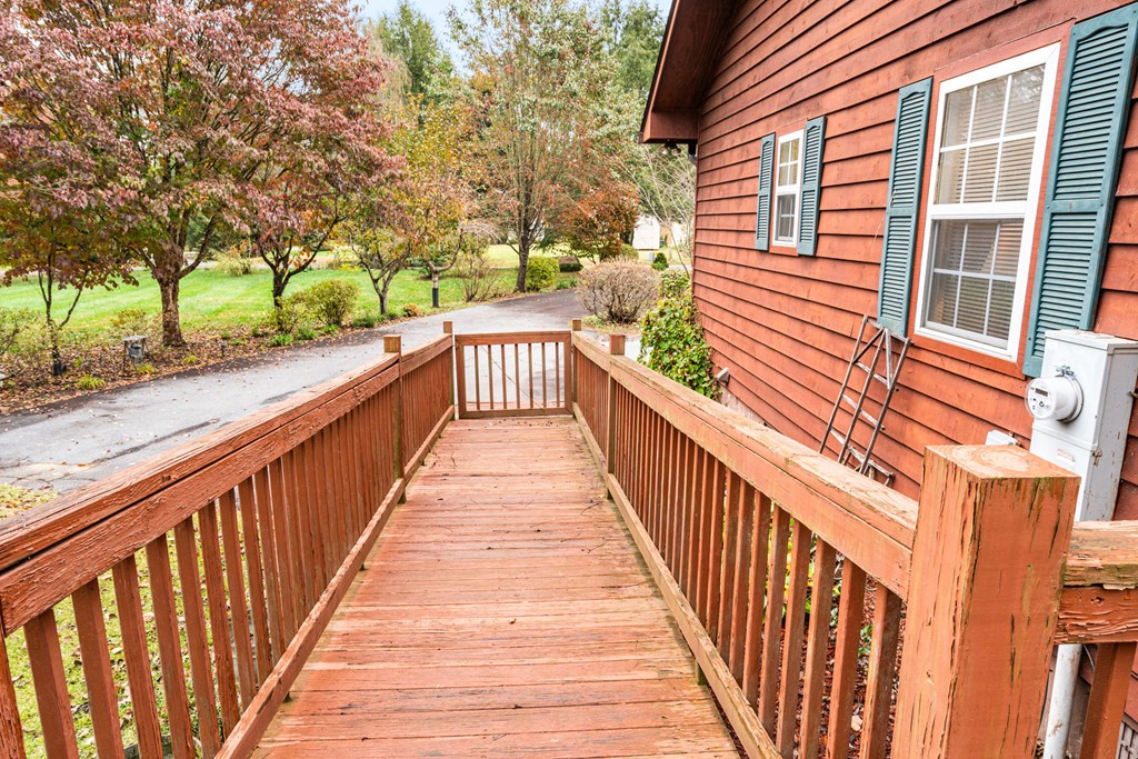 251 Rivers Edge Drive Hayesville, NC 28904 - Photo 43 of 45 a view of a house with wooden stairs