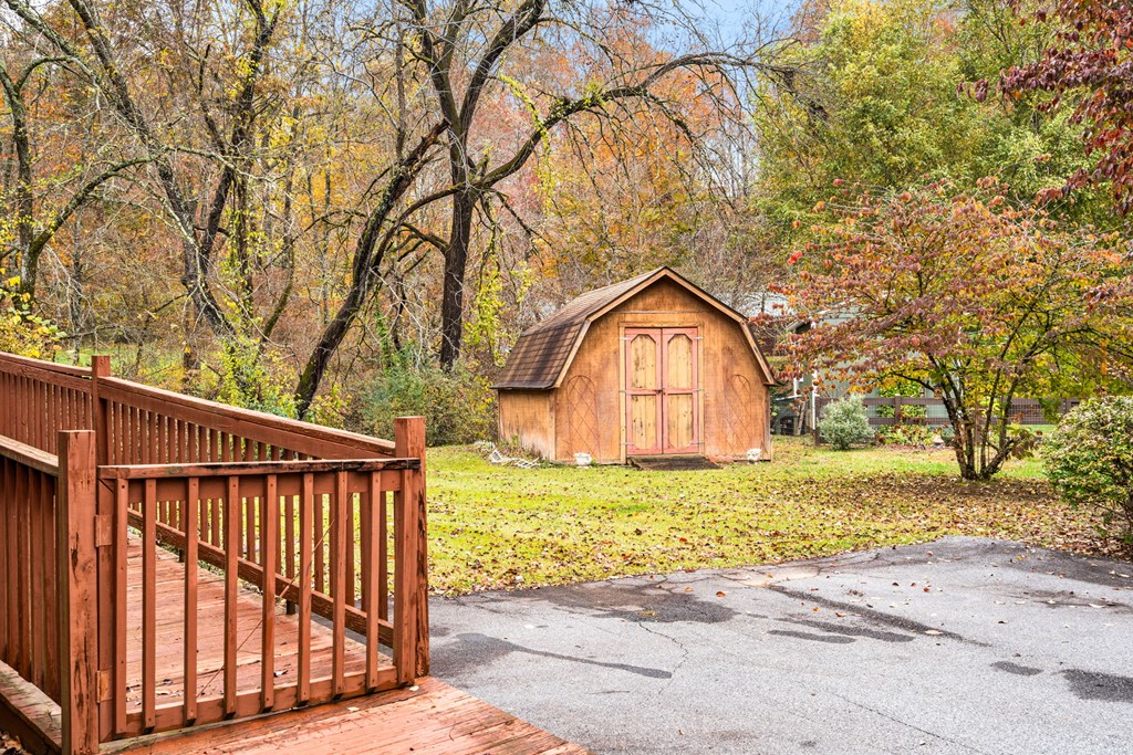 251 Rivers Edge Drive Hayesville, NC 28904 - Photo 44 of 45 a view of a wooden fence and a trees