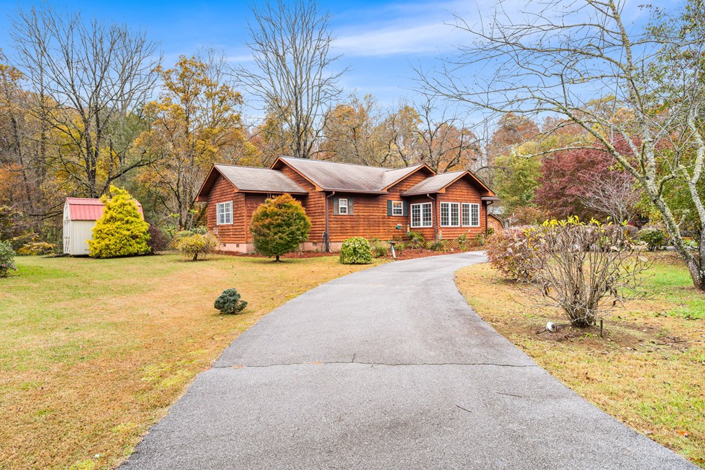 251 Rivers Edge Drive Hayesville, NC 28904 - Photo 8 of 45 a view of house with yard