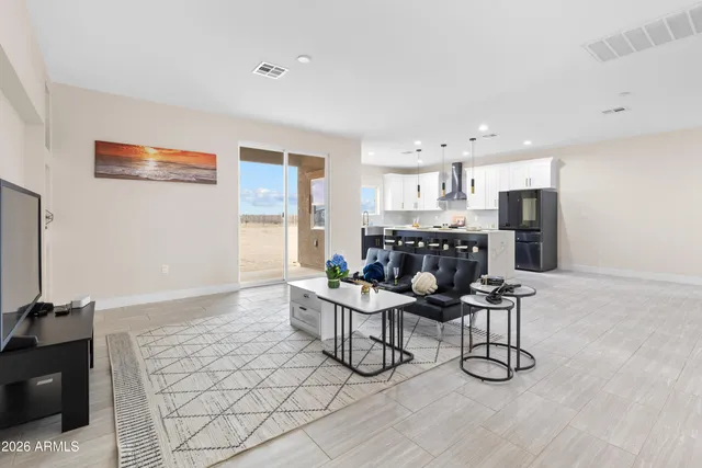 a view of a small space with wooden floor