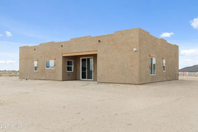 a front view of a house with windows