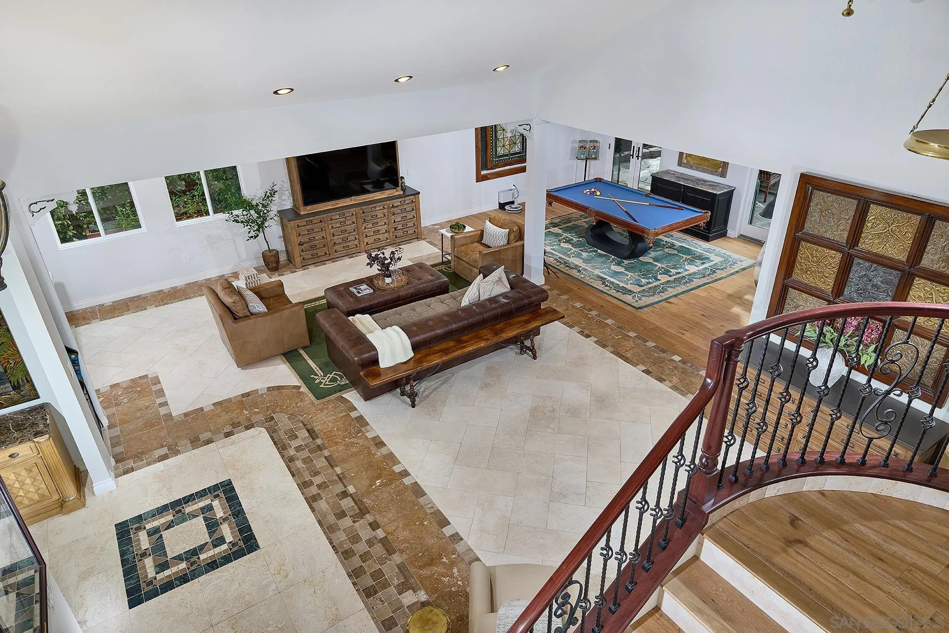10616 Falcon Rim Point San Diego, CA 92131 - Photo 20 of 44 a living room with furniture and a flat screen tv