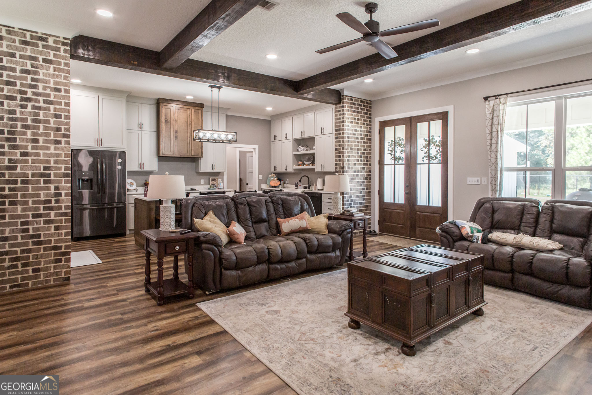 664 Saddle Circle Waycross, GA 31503 - Photo 14 of 39 a living room with furniture and a large window