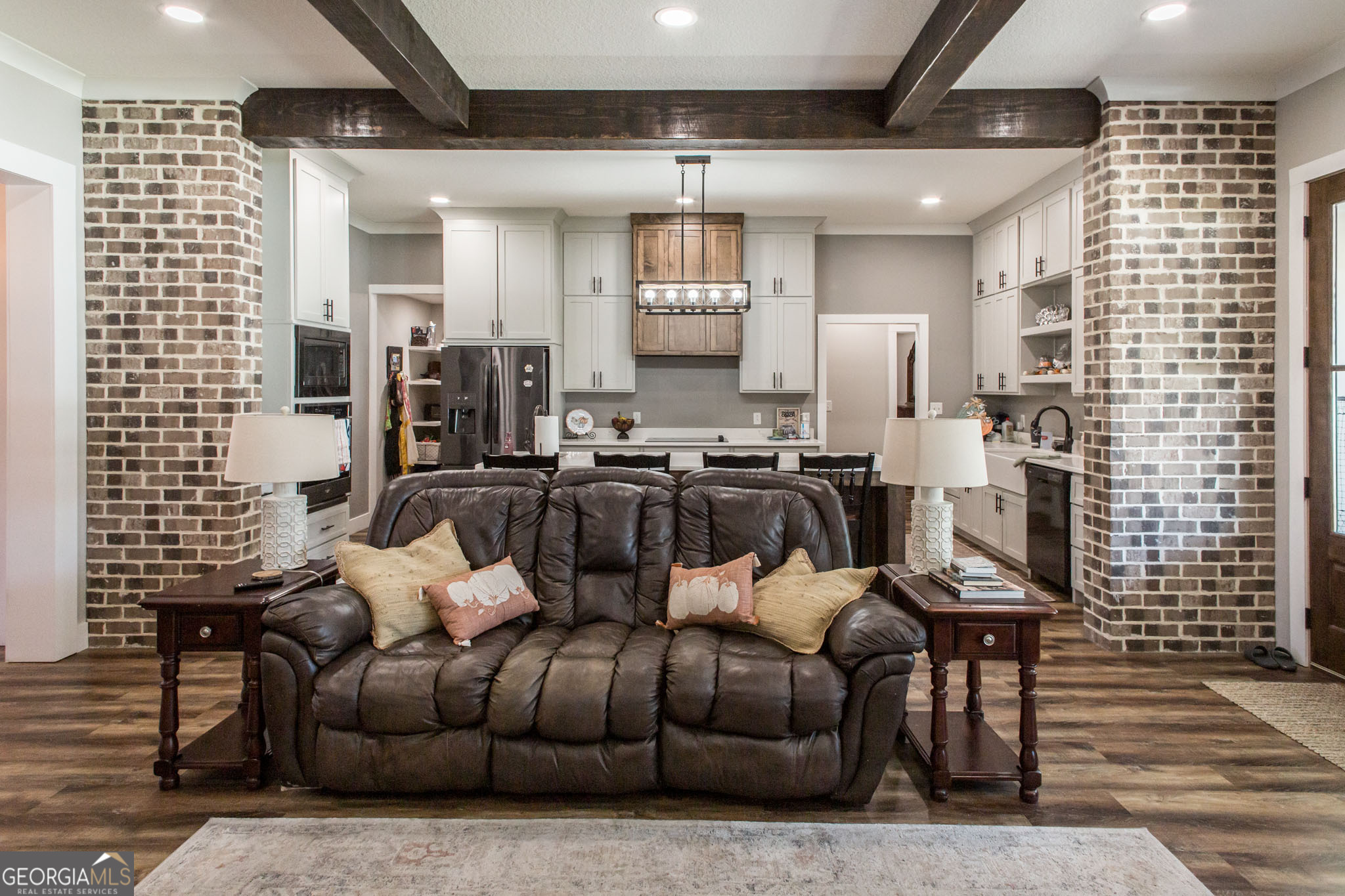 664 Saddle Circle Waycross, GA 31503 - Photo 15 of 39 a living room with furniture and a fireplace