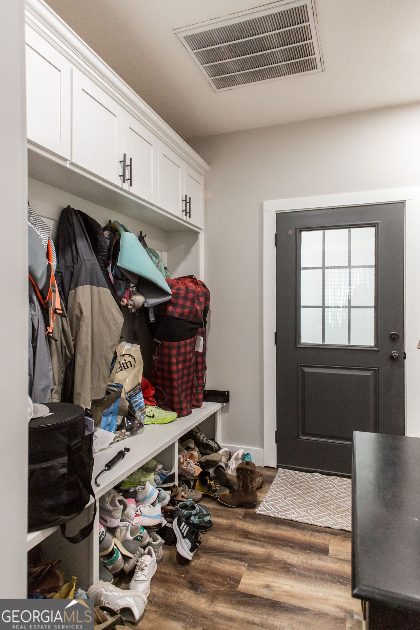 664 Saddle Circle Waycross, GA 31503 - Photo 33 of 39 a view of walk in closet with clothes and shoes