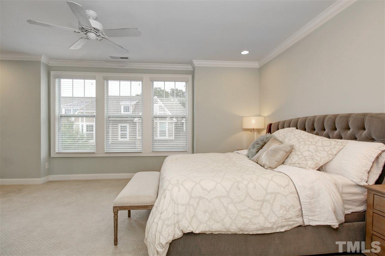788 Fallon Grove Way Raleigh, NC 27608 - Photo 14 of 30 a bedroom with a bed and a window