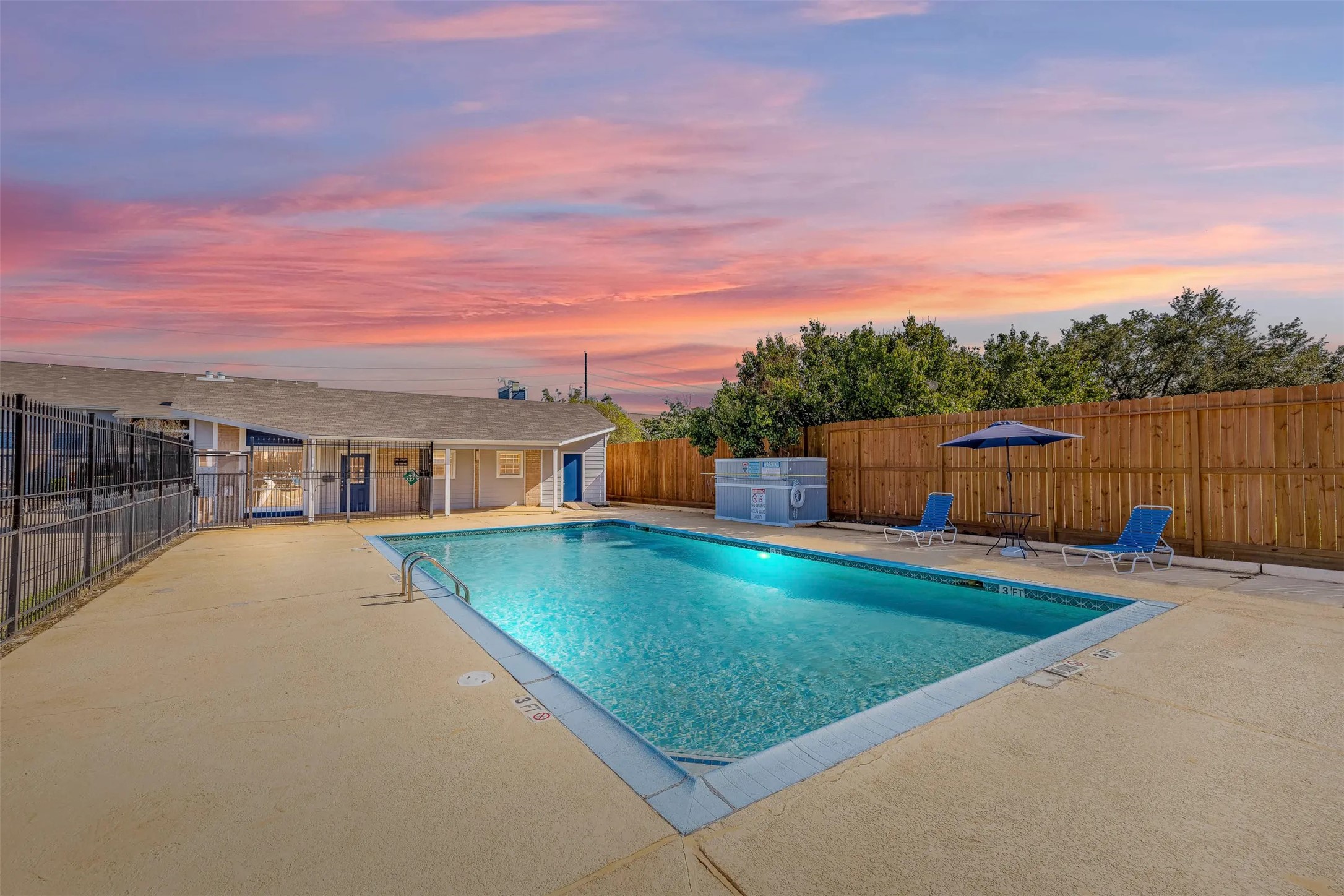 2700 South Dairy Ashford Road, Unit 613B Houston, TX 77082 - Photo 12 of 15 a swimming pool with outdoor seating and barbeque oven