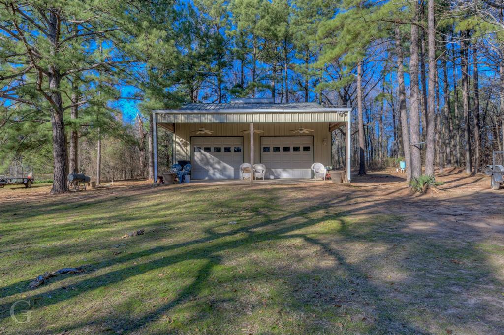 111 White Road Frierson, LA 71027 - Photo 5 of 18 a view of a park that has a large tree