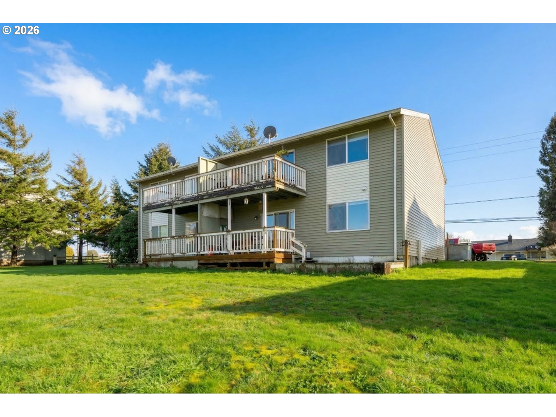 5514 3rd Street Tillamook, OR 97141 - Photo 2 of 25 a view of a house with a yard