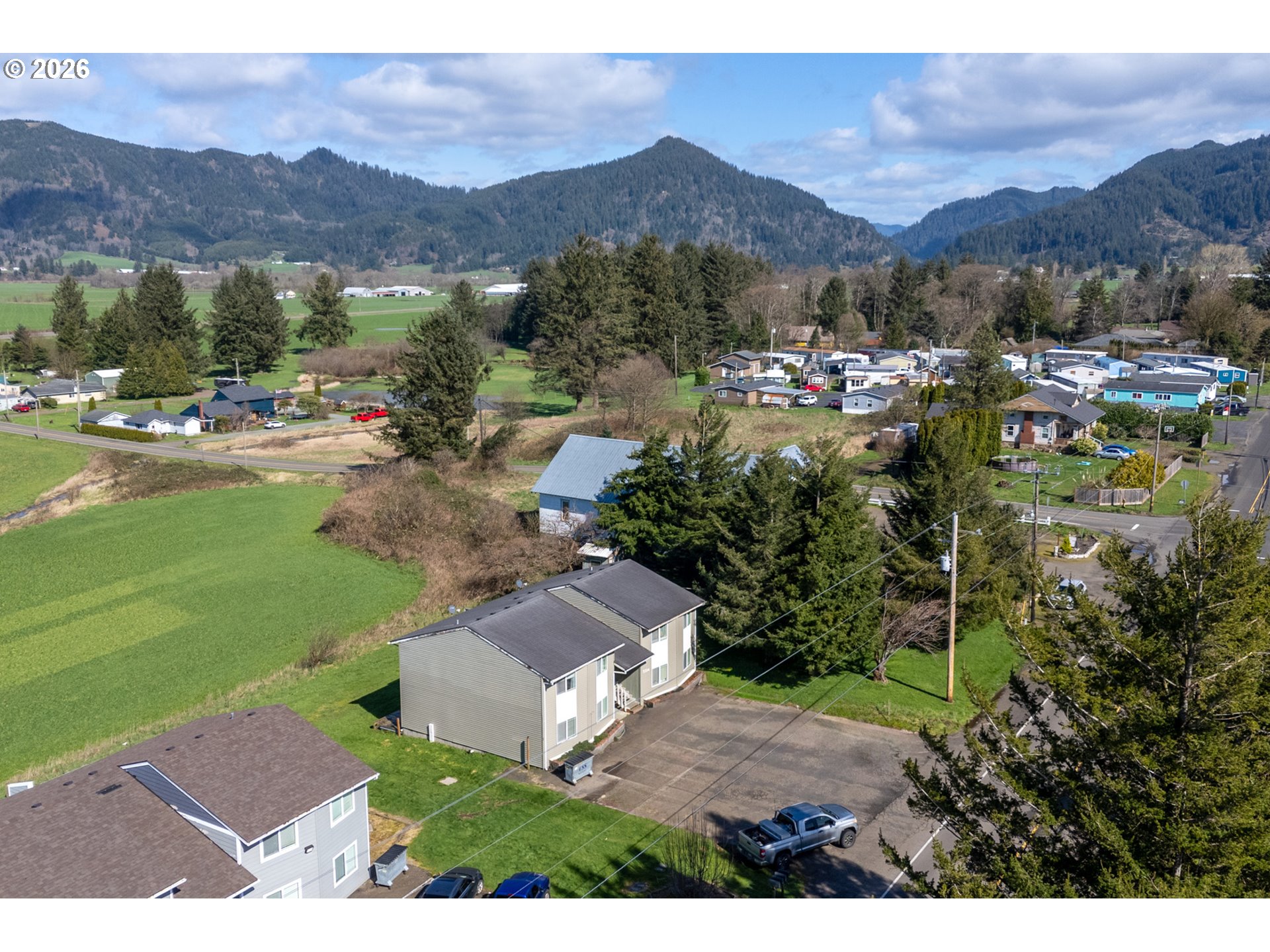 5514 3rd Street Tillamook, OR 97141 - Photo 22 of 25 a view of a city with mountain