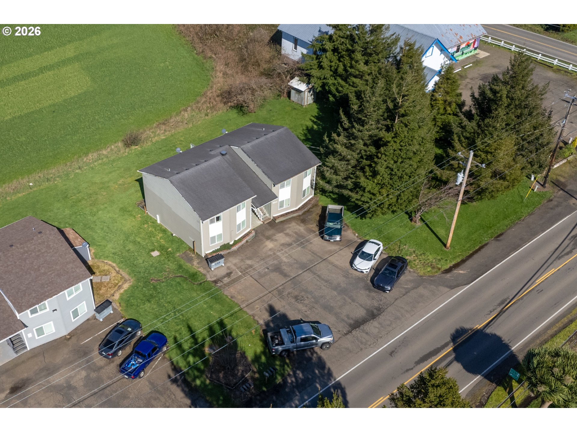 5514 3rd Street Tillamook, OR 97141 - Photo 24 of 25 a view of a house with a yard