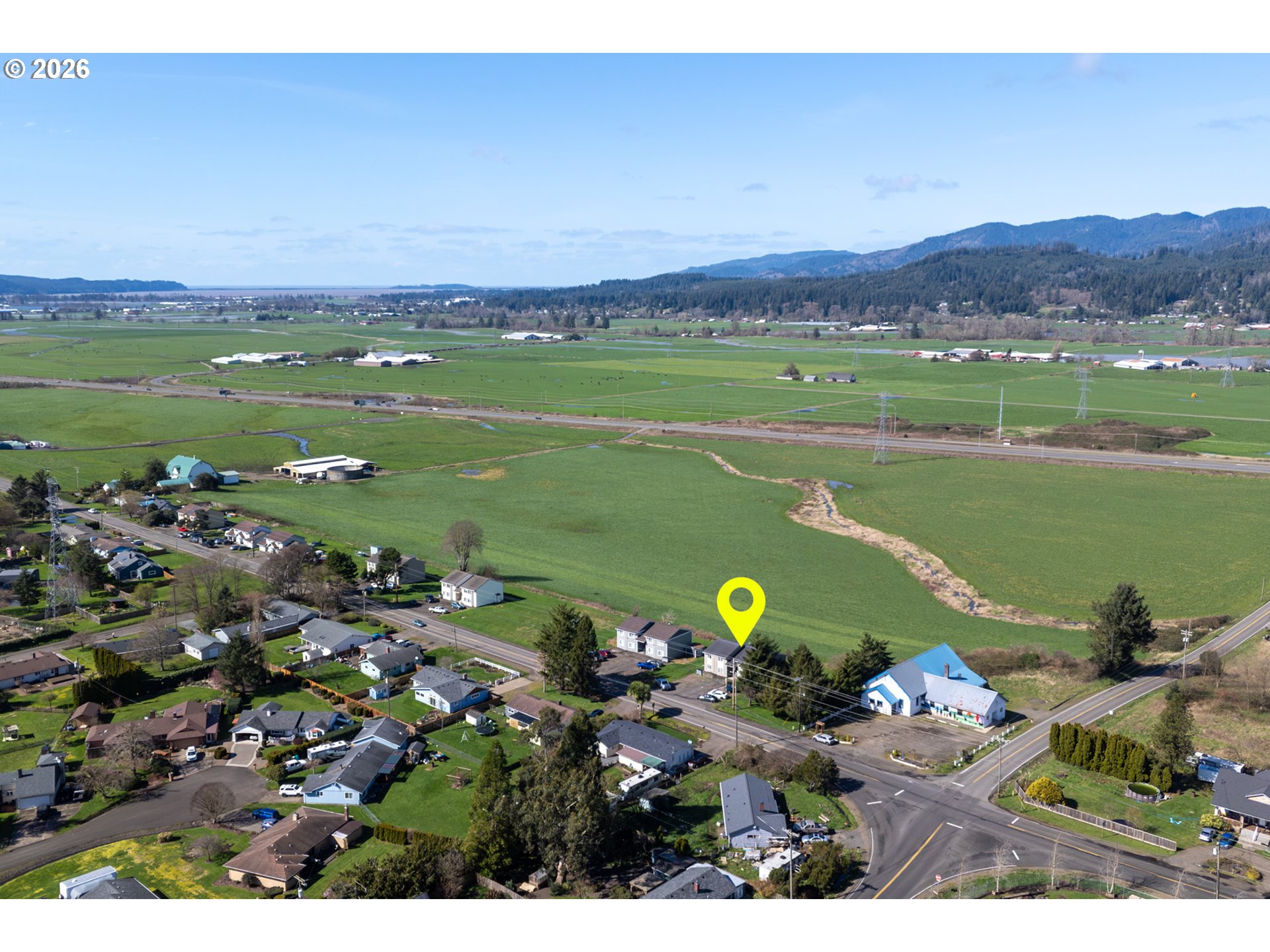 5514 3rd Street Tillamook, OR 97141 - Photo 5 of 25 a view of a city with a lake
