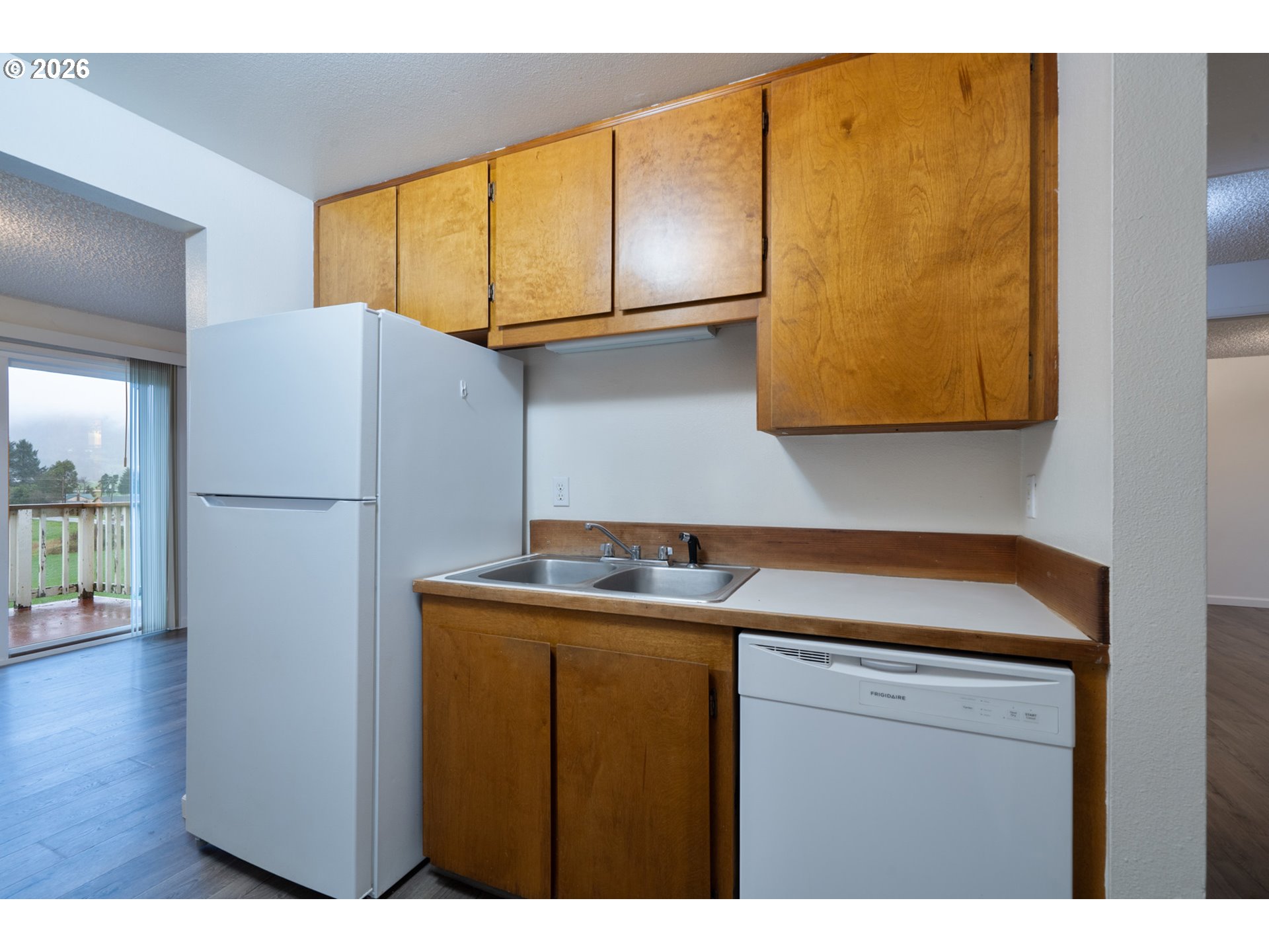 5514 3rd Street Tillamook, OR 97141 - Photo 8 of 25 a room with storage and utility