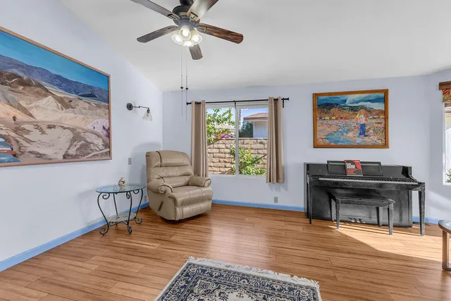 a bed room with a bed and a window